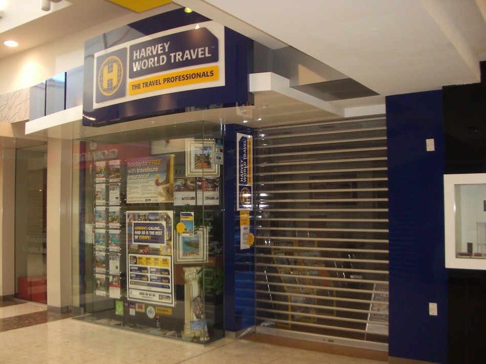 Branded Retail Store Frontage - Harvey World Travel
